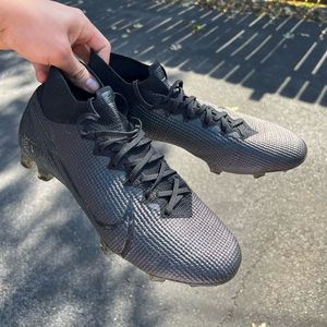 Blacked out Nike Mercurial Size 9.
